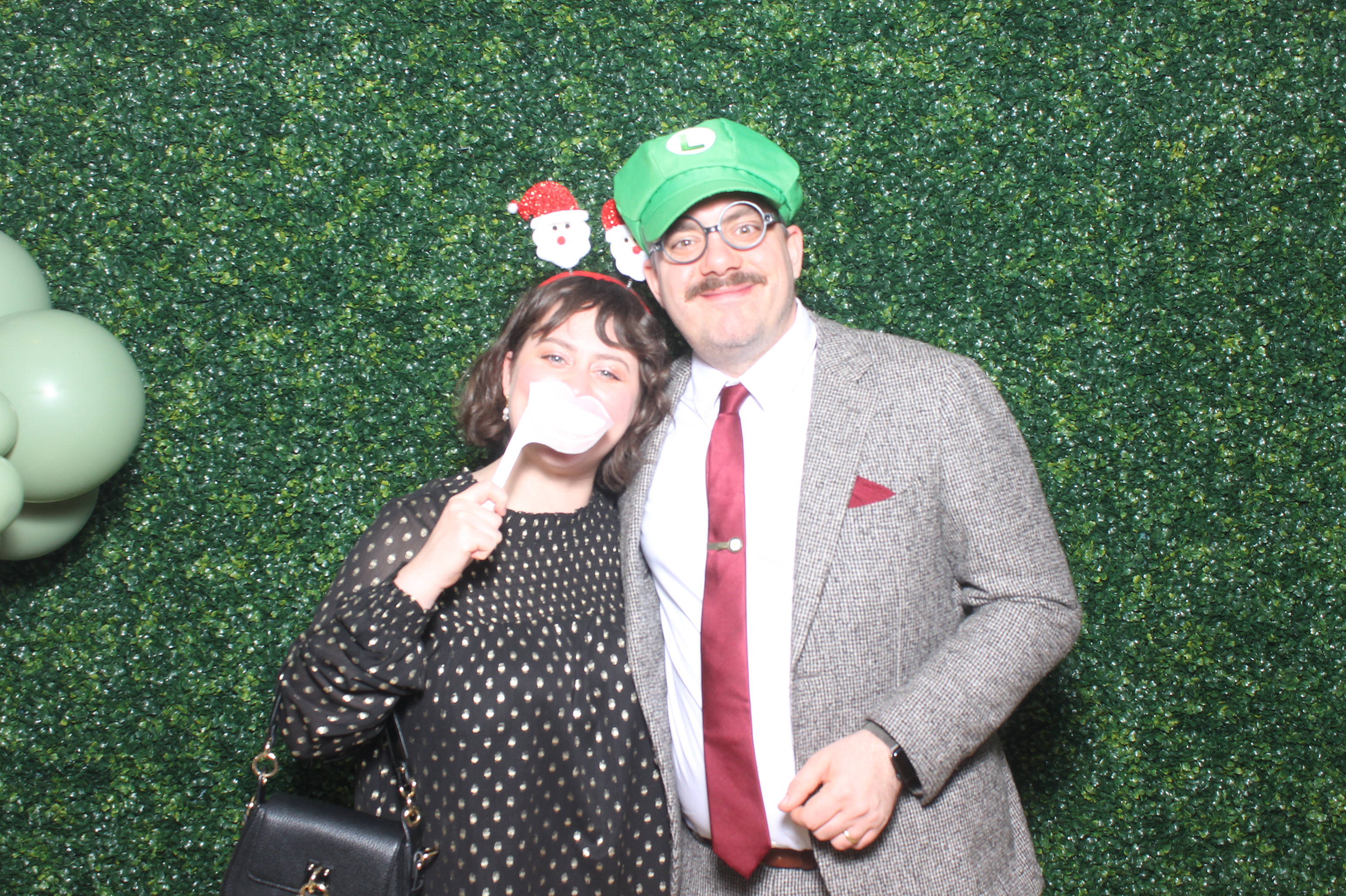 Benchmark Gensuite Year End Party 2024 | View more photos from the event at gallery.photoboothcincy.com/u/PhotoBoothCincy/Benchmark-Gensuite-Year-End-Party-2024